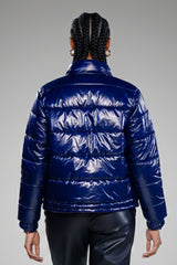 Navy Voyager™ Glossy Puffer Jacket – Lightweight Travel Winter Coat